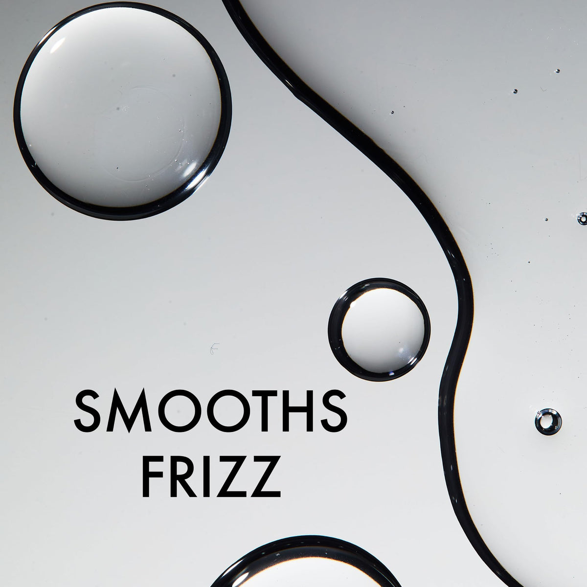 John Frieda Frizz Ease Leave-In Conditioner with styling tools