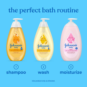 Johnson's Baby Shampoo bottle in hand during bath time