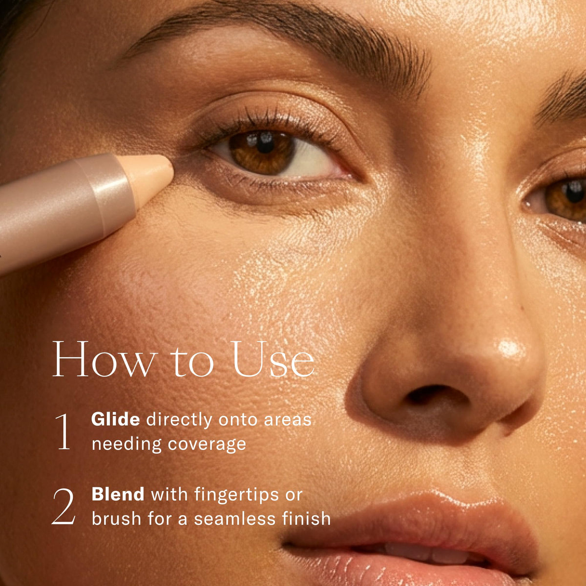 Josie Maran Argan Cream Concealer Crayon Dark 1 with makeup brush