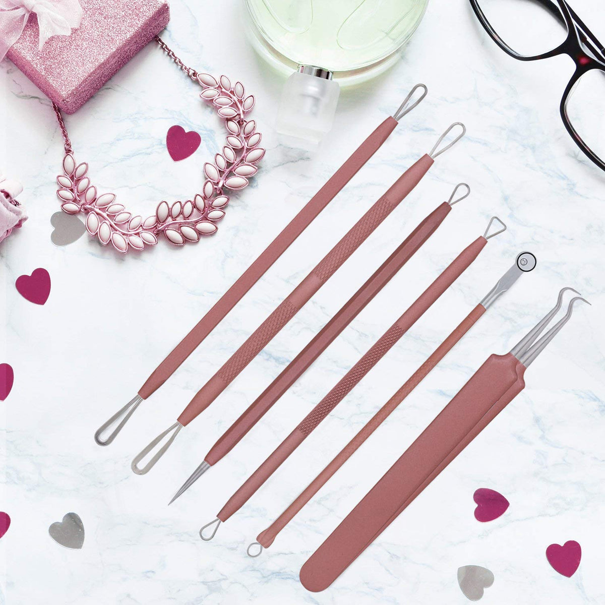 JPNK blackhead remover tools in use on skin
