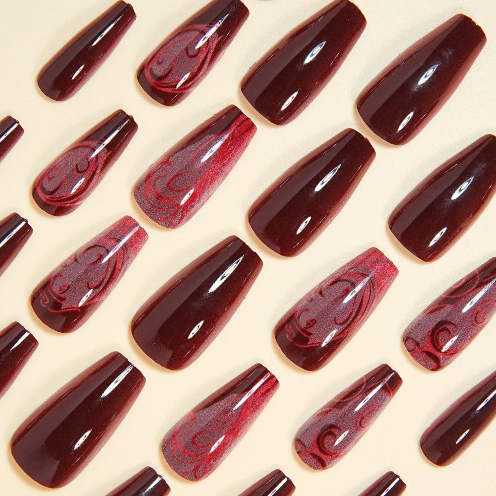 juggssa acrylic nails displayed with nail file and glue stickers