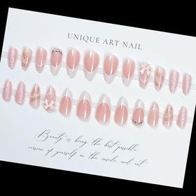 juggssa Almond Press on Nails with 3D bow charms and rhinestones
