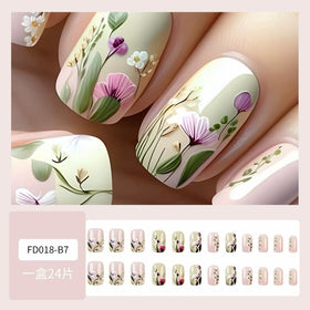 juggssa Press On Nails application process with glue stickers