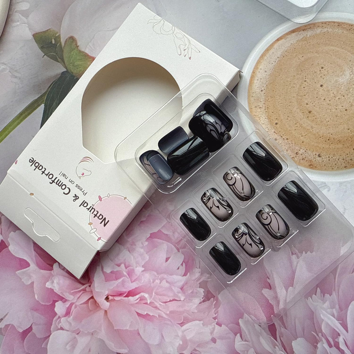 juggssa press on nails applied on fingers