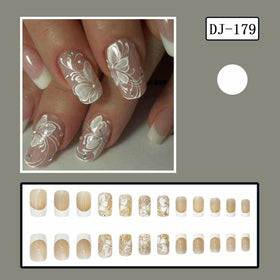 juggssa press on nails displayed in packaging with nail file and wooden stick