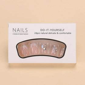 juggssa Press On Nails Kit packaging with acrylic nails and accessories