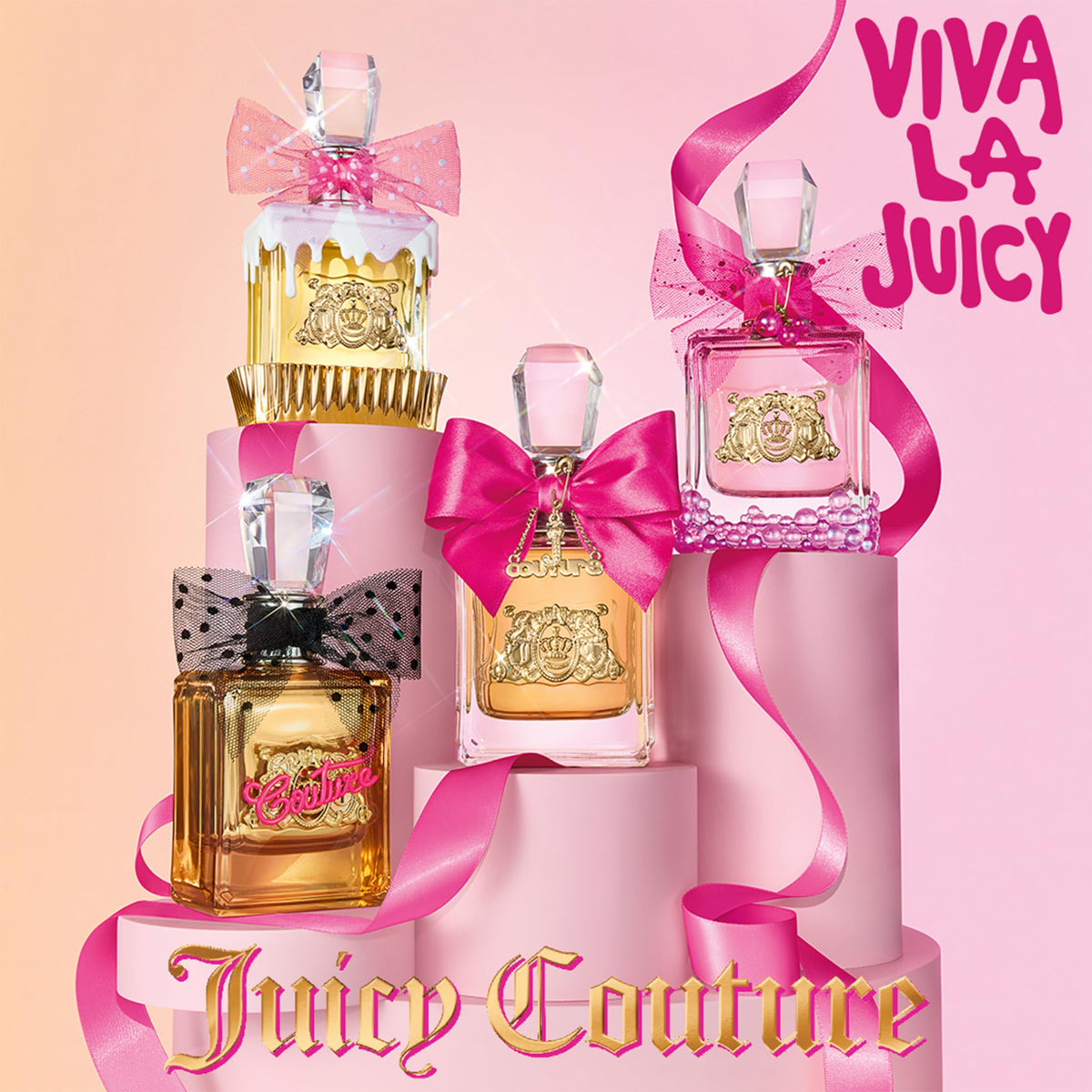 Juicy Couture Viva La Juicy Eau de Parfum travel size next to accessories