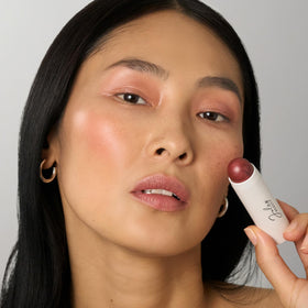 Julep Cream Blush & Lip Color Stick Desert Rose applied on cheeks