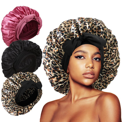 Kafteri Silk Bonnet for Sleeping in Black Leopard Rose-pink front view