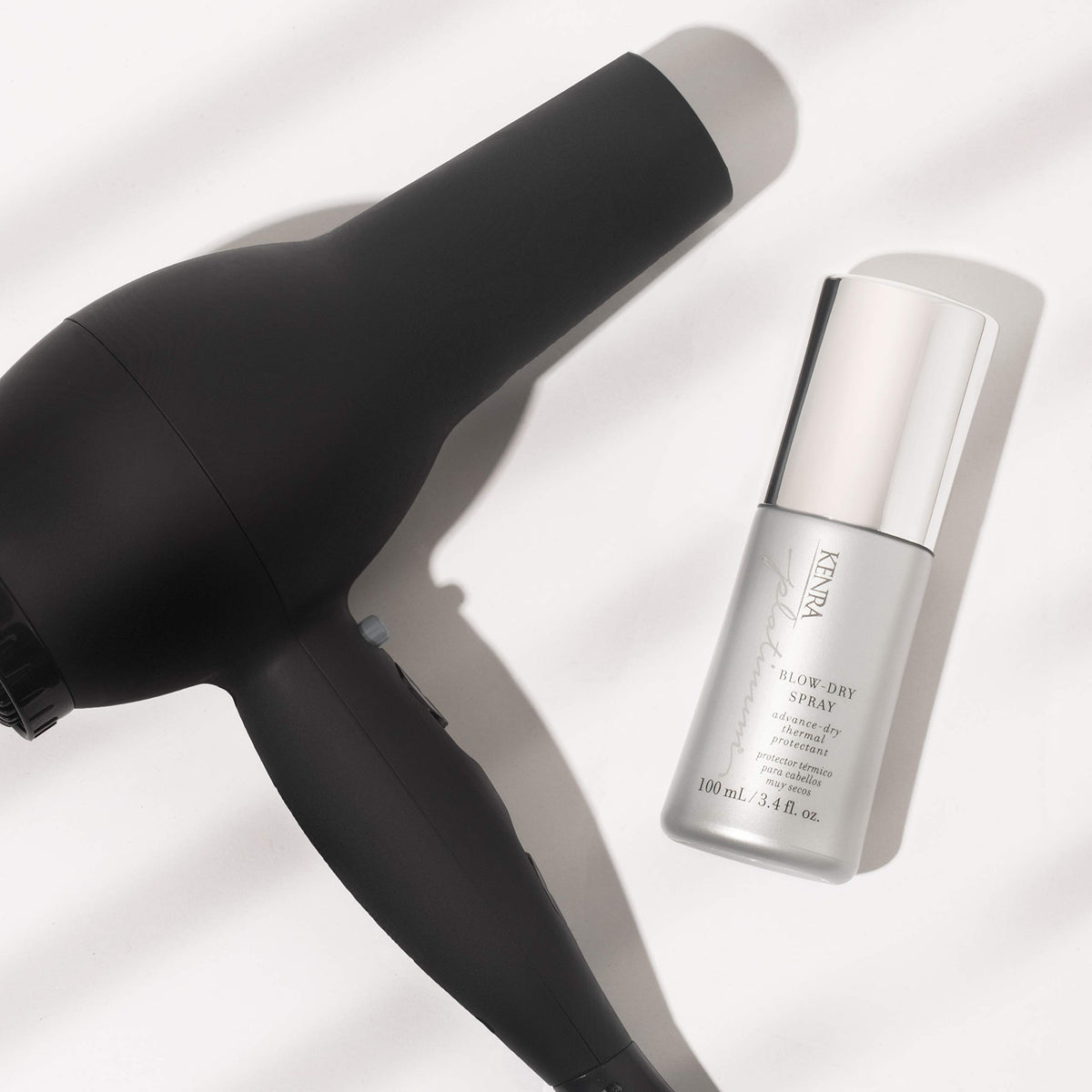 Kenra Blow-Dry Spray on a bathroom counter