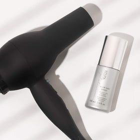 Kenra Blow-Dry Spray on a bathroom counter
