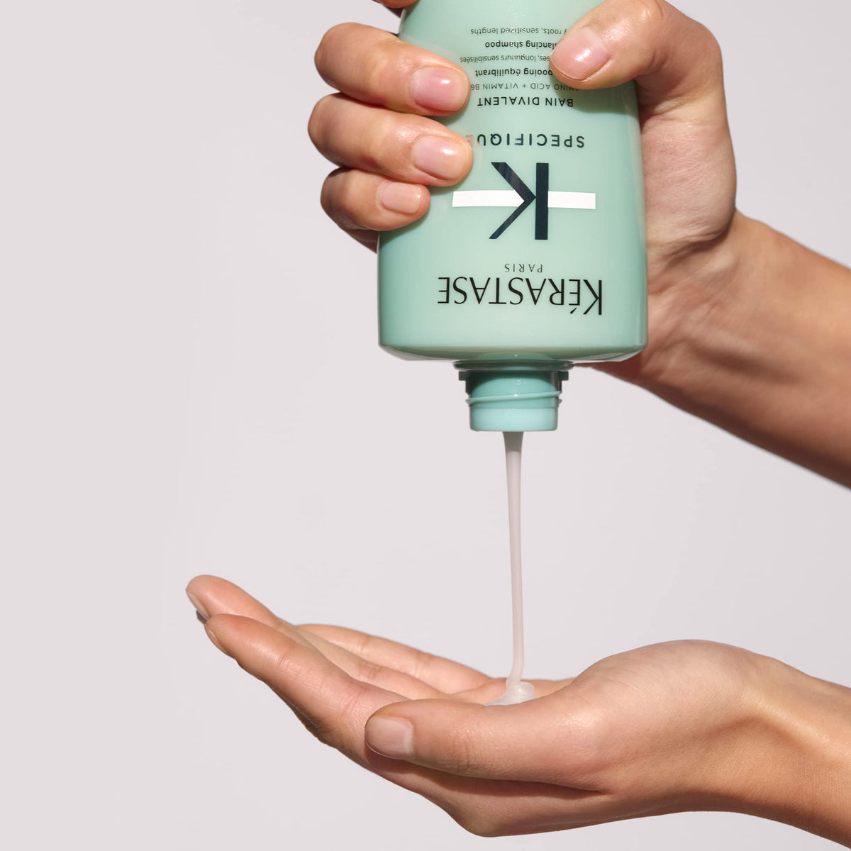 KÉRASTASE Bain Divalent Balancing Shampoo with fresh flowers