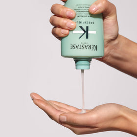 KÉRASTASE Bain Divalent Balancing Shampoo with fresh flowers