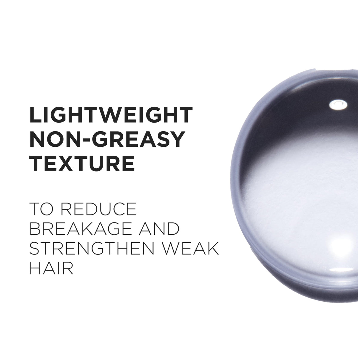 KÉRASTASE Genesis Hair Serum in lifestyle setting on vanity