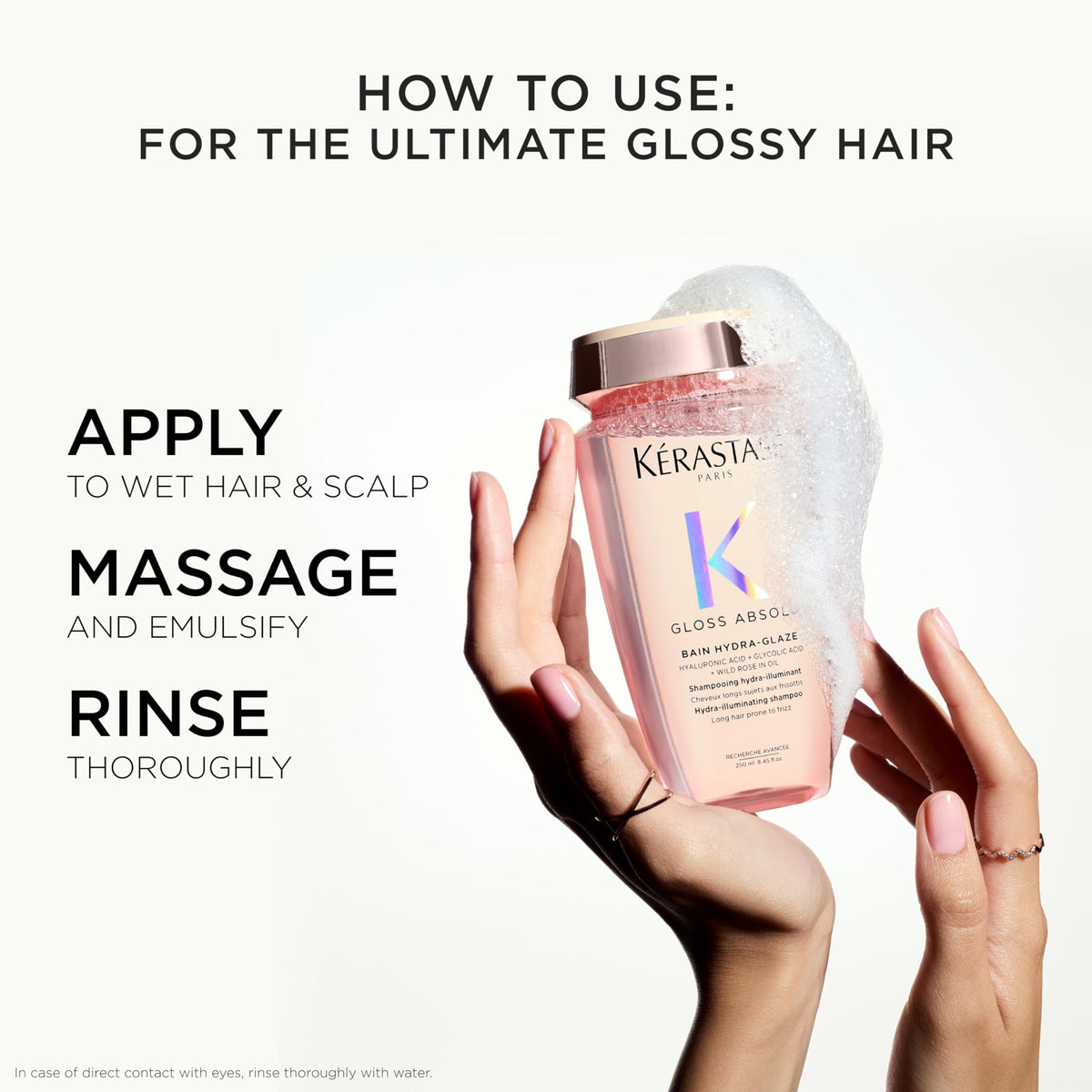 KÉRASTASE Gloss Absolu Shampoo with floral background