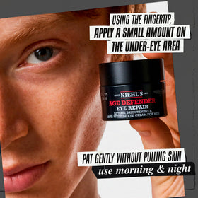 Kiehl's Age Defender Men's Skincare Set displayed on a bathroom shelf