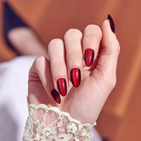 KISS Press On Nails 'Apple Blossom' red nails displayed with manicure stick and file