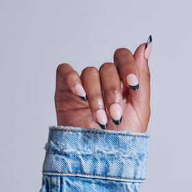 KISS Press On Nails kit including glue, manicure stick, and mini file