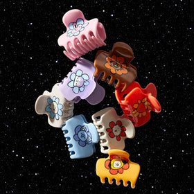 Kitsch BT21 hair clip displayed on a flat surface