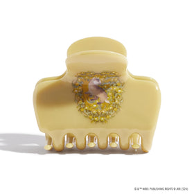 Kitsch Harry Potter Hufflepuff hair clip on a model