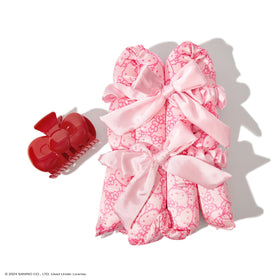 Kitsch Hello Kitty bow clip securing styled curls
