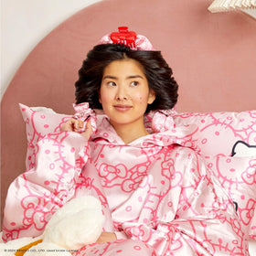 Kitsch Hello Kitty set with hair styled in bouncy curls