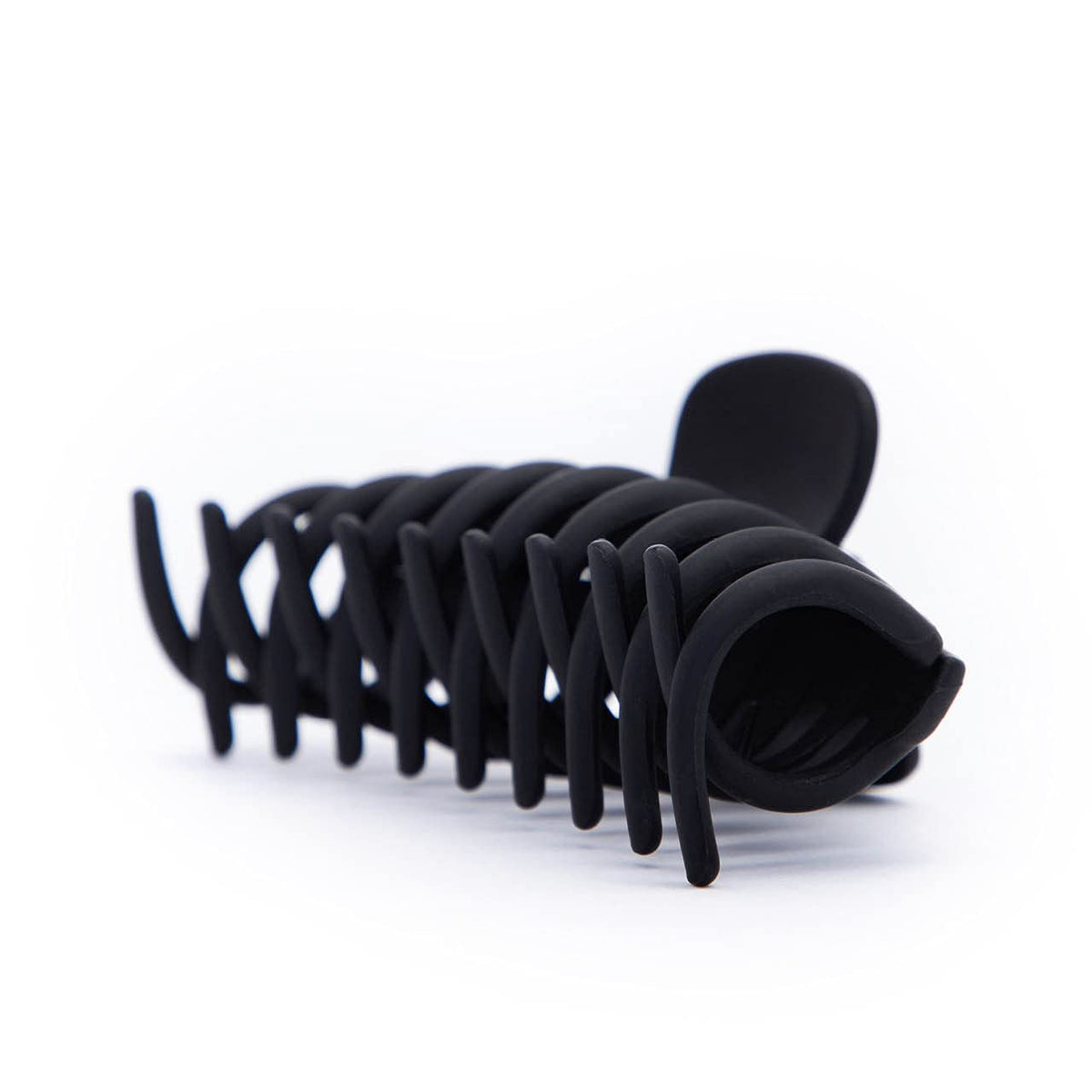 Kitsch Large Hair Clips with packaging on a table