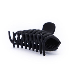 Kitsch Large Hair Clips with packaging on a table