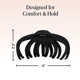 Kitsch Octopus Hair Clip holding a messy bun