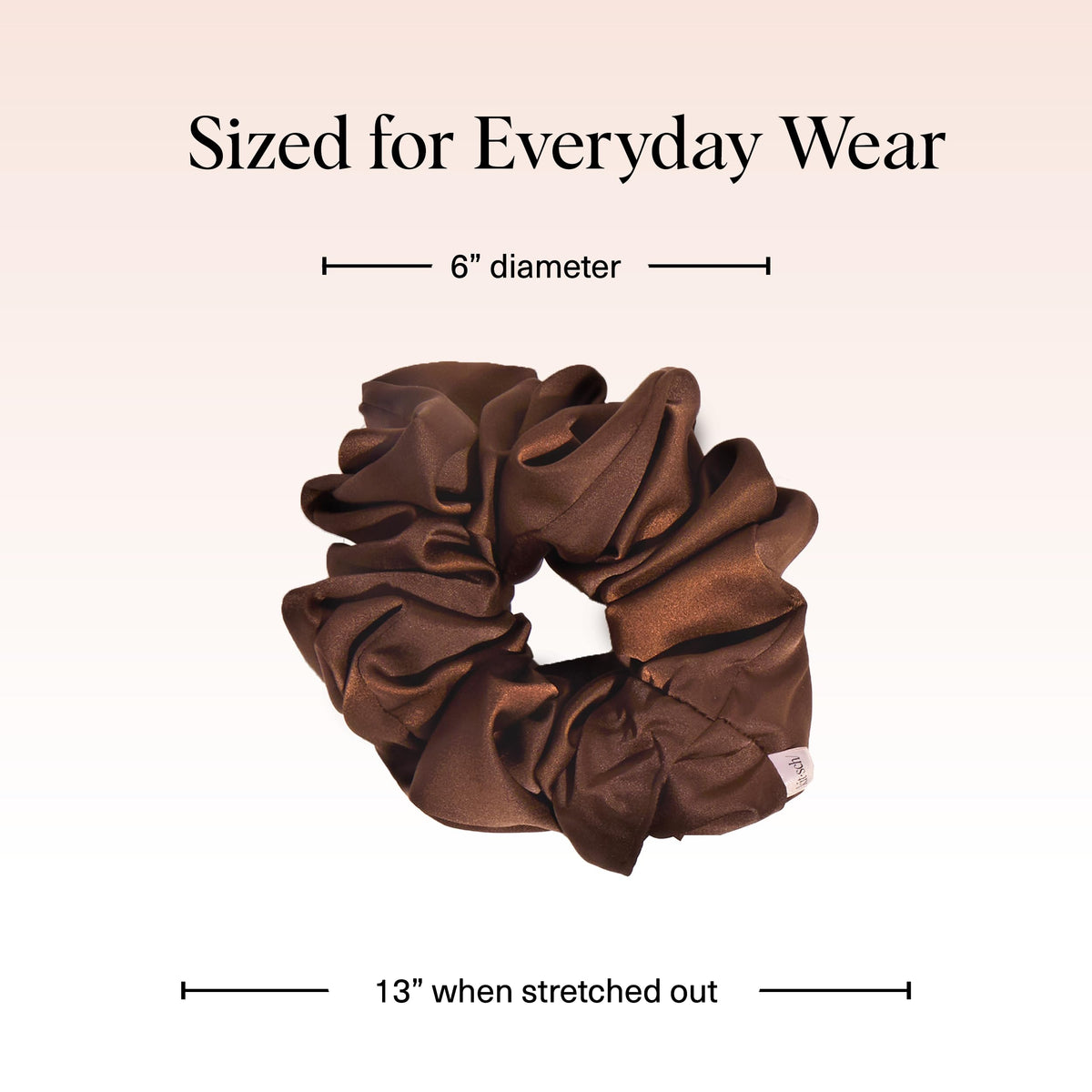 Kitsch oversized scrunchies worn on wrist as accessory