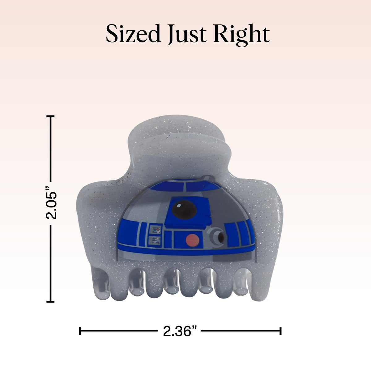 Kitsch R2-D2 hair clip displayed with other hair accessories