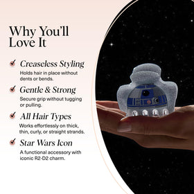 Kitsch R2-D2 hair clip in a lifestyle setting on a table