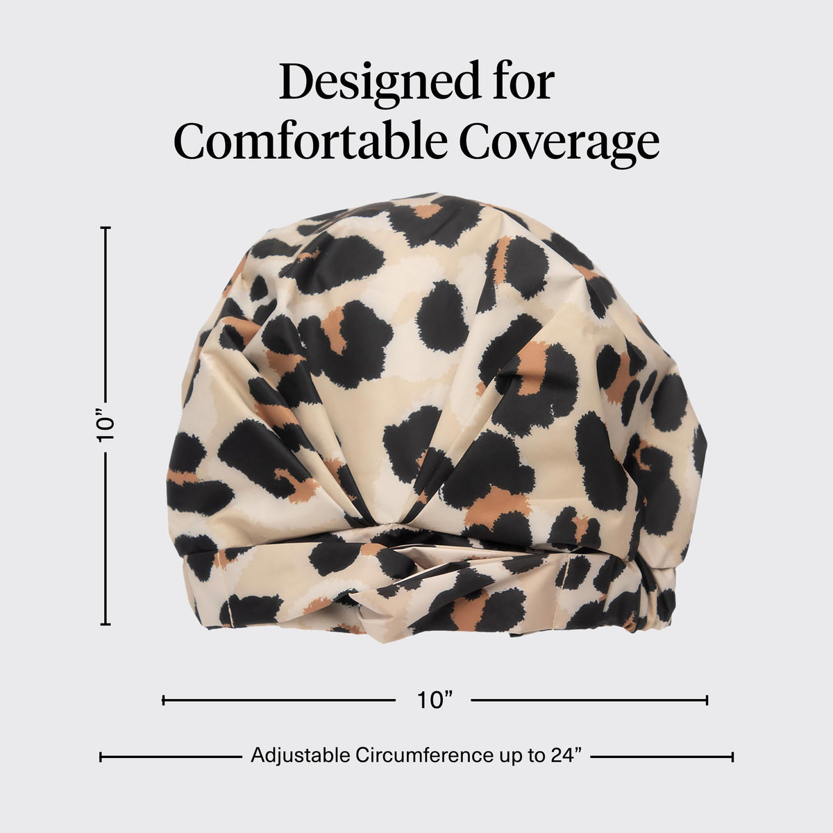 Kitsch Shower Cap Leopard design on a bathroom shelf