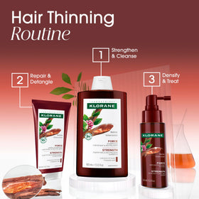 Klorane Thickening Shampoo with Quinine on a wooden table