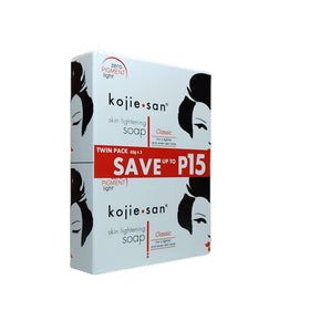 Kojie San Soap displayed with coconut and tea tree oil