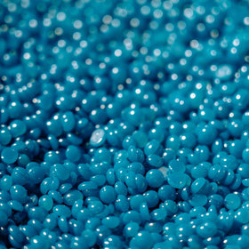 KoluaWax Wax Beads packaging with applicator sticks