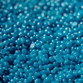 KoluaWax Wax Beads packaging with applicator sticks