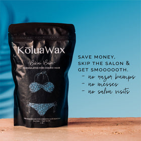 KoluaWax Wax Beads with applicator sticks on a table