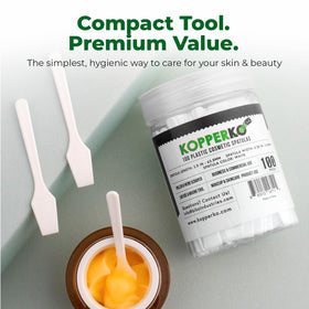Kopperko Mini Skin Care Spatula in a makeup bag