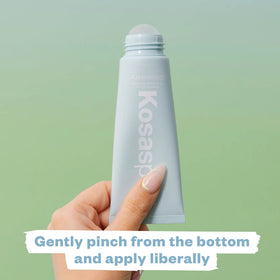 Kosas Chemistry AHA Serum Deodorant in hand showing size