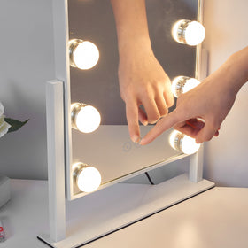 Kotdning Vanity Mirror on a makeup table with beauty products