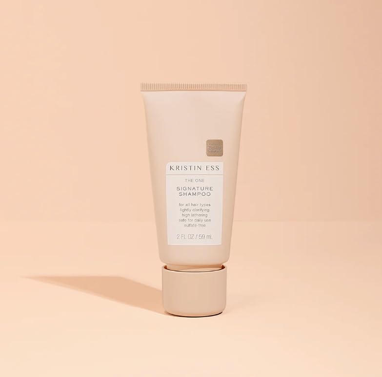 Kristin Ess Signature Shampoo and Conditioner Set on a bathroom counter