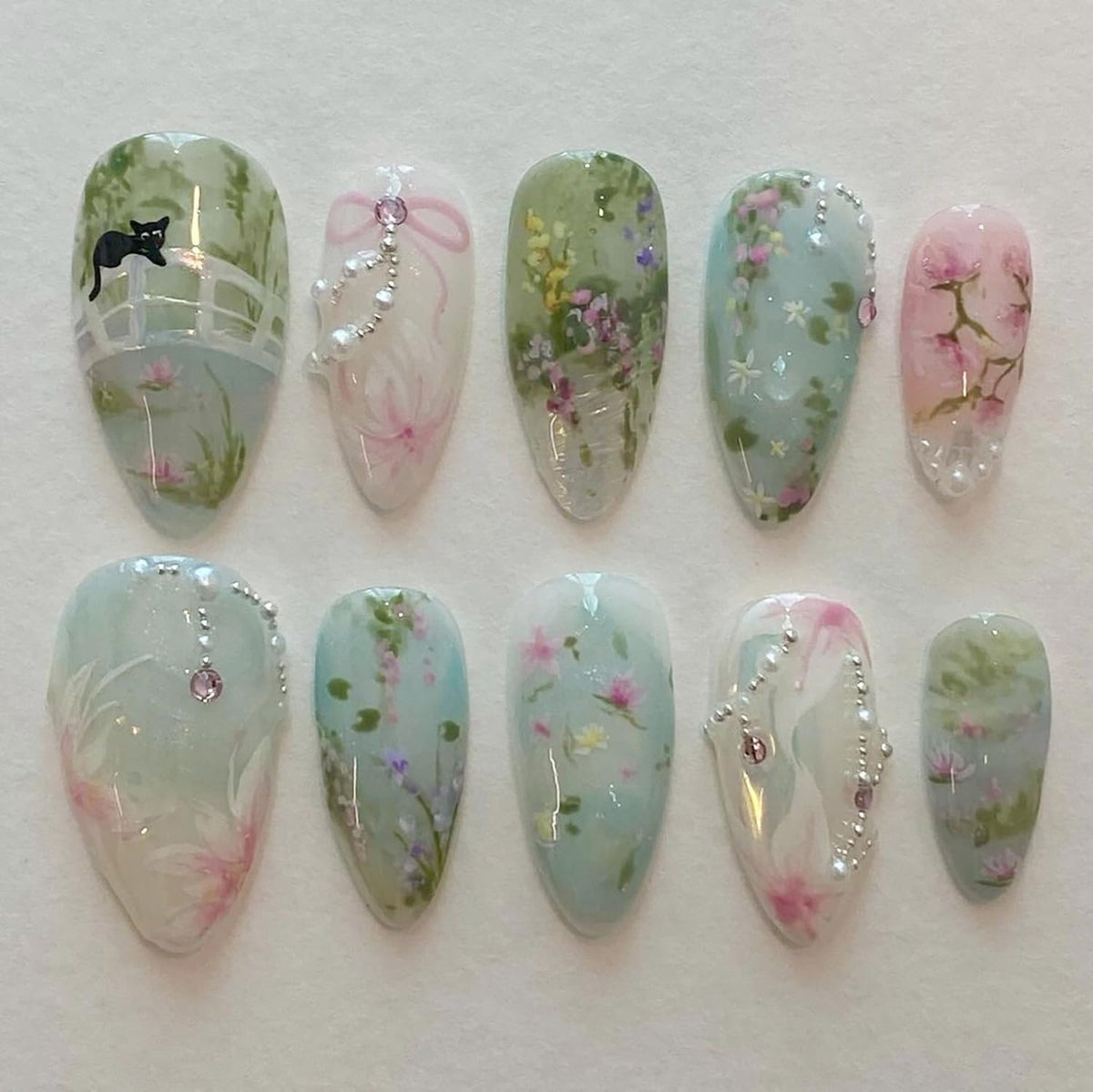 KRTBKR 24 pcs medium almond press on nails floral design front view
