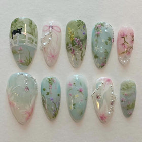 KRTBKR 24 pcs medium almond press on nails floral design front view