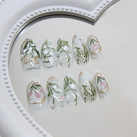 KRTBKR 24Pcs Medium Almond Green Press On Nails in packaging