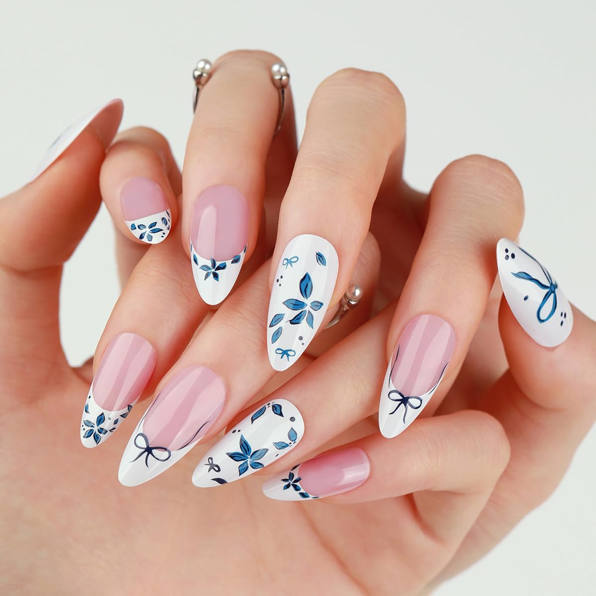 KRTBKR floral design press on nails with blue bow