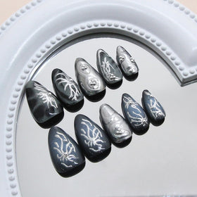 KRTBKR Goth Press On Nails displayed in various sizes