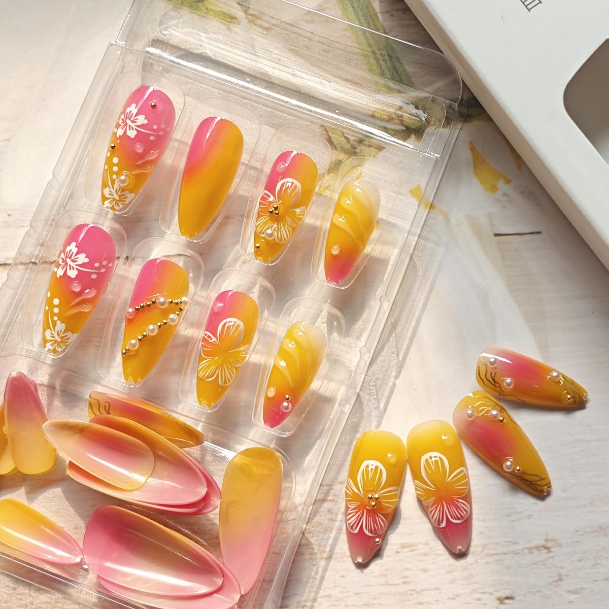 KRTBKR medium almond fake nails close-up