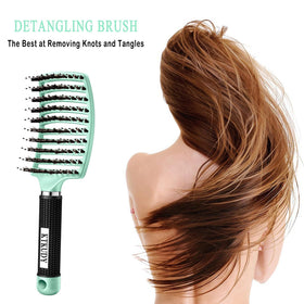 KTKUDY Detangling Brush in use on wet hair