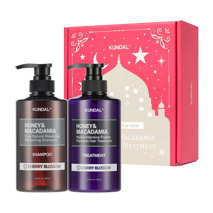 KUNDAL Honey & Macadamia Shampoo front view with cherry blossom design